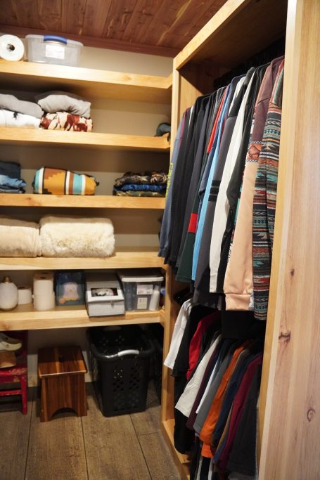 Inside closet showing custom crafted Amish shelves.